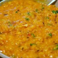 Tadka Daal · Chef's special lentil full of nutritious flavor, seasoned with freshly ground spices and sau...