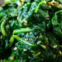 Saag Bhaji · Fresh spinach cooked with chopped onions, tomatoes, ginger and spices.