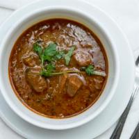 Beef Nihari · Spicy Boneless Beef Curry.
Add Rice,  Paratha, Chappati, Naan and Garlic Naan for an additio...