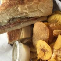Omelette Sandwich · Served on a white or wheat french baguette with your choice of plantain and potato chips or ...