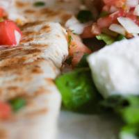 Cheese Quesadillas · Monterey jack, and cheddar. Served with sour cream and pico de gallo.
