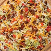 Taco Pizza · Pepperoni, sausage, onions, mushrooms, green peppers, lettuce, tomatoes and topped with chee...