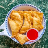 Crab Meat Rangoon · Crab and cream cheese. Served with eight pieces.