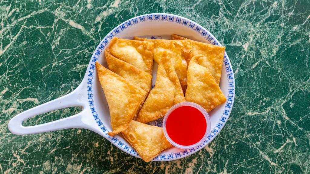 Crab Meat Rangoon · Crab and cream cheese. Served with eight pieces.