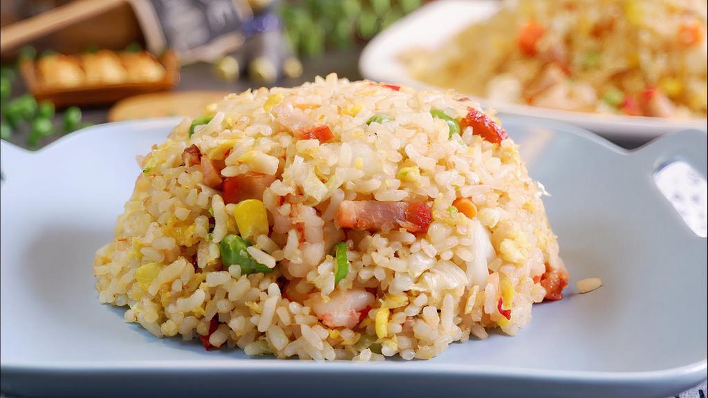 House Special Fried Rice · pork,chicken,shrimp,peas carrots,onion