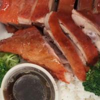 Roast Pork With Broccoli · Served with white rice.