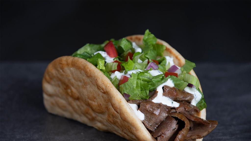 Gyro Wrap Meal · Most popular. With lettuce,red onion ,tomatoes and Z-sauce wrapped in a grilled pita.