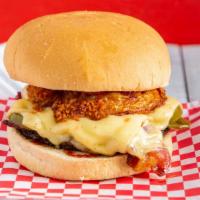 Cowboy Hamburger · Pepper jack cheese, onion rings, bacon, BBQ sauce and jalapeños.