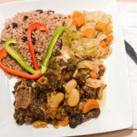 Oxtail · Fall off the bone beef, cooked in its own stew. With a deep and rich flavorful taste.
