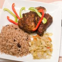 Jerk Chicken · Infamous jerk chicken, cooked in its jerk marinade. To provide an authentic Jamaican taste.