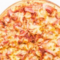 Hawaiian · Thin crust, sweet pineapple, bacon bites, Canadian bacon, home made pizza sauce and 5 cheese...