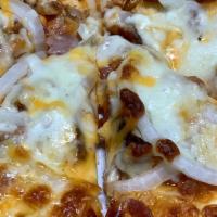 Gyro Pizza · Thin crust, gyro meat, onion, tomato, feta cheese, tzatziki sauce and 5 cheese blend.