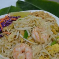 Pad Thai  · Sauteed rice noodles with green onions, egg, bean sprouts and topped with crushed peanuts.