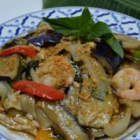 Eggplant Delight  · Sauteed onions, green peppers and baby eggplant in a special sauce and topped with fried gar...