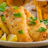 Fish & Chips · Alaskan cod hand-dipped in our house-made beer batter served with fries and a side of colesl...