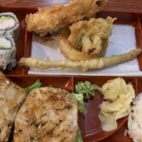 Chicken Teriyaki Platter · Grilled chicken in teriyaki sauce.  Served with half California roll, miso soup, tempura, an...