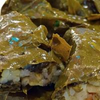 Grape Leaves · Eight grape leaves stuffed with either; veggies and rice or beef and rice.