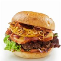 The Finesse Burger · Inviting 1/2 lb. burger decorated with shai king sauce, cheddar cheese, bacon, lettuce, toma...