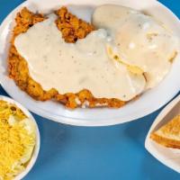 Chicken Fried Steak Dinner · Chicken fried steak topped with cream gravy, served with two sides, and texas toast.