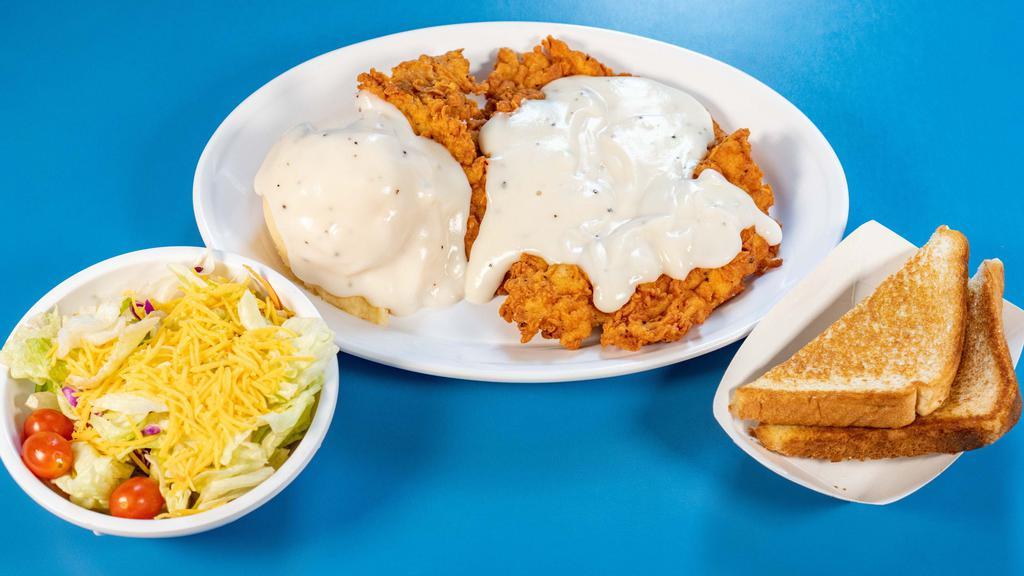Chicken Fried Chicken Dinner · Chicken fried chicken topped with cream gravy, served with two sides, and texas toast.