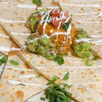 Quesadilla Pollo · Chicken a large flour tortilla quesadilla with cheese and choice fill, accompanied with lett...