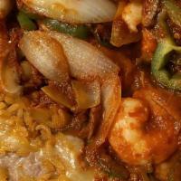 Camarones A La Diabla · Spicy and Gluten Free. Shrimp marinated in spicy sauce sautéed with onions, bell peppers and...