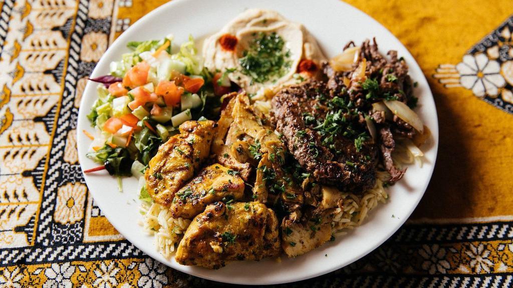 Meat Combo · Chicken kabob, beef kabob, chicken shawarma and beef kufta. Served with basmati rice, hummus, green salad and pita bread.