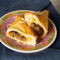 Curry Beef Puff - 咖喱牛肉角 · Baked puff pastry filled with curry beef. Dairy free.