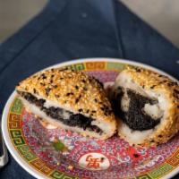 Black Sesame Ball - 黑芝麻球 · Crispy fried glutinous rice ball filled with black sesame paste. Vegan and gluten free.