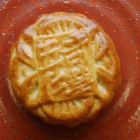 Red Bean Cake - 豆沙餅 · Mooncake filled with red bean paste. Vegan. Contains peanut oil.