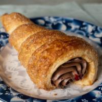 Buttercream Cone - 忌亷奶油筒 · Flaky puff pastry filled with buttercream. Vegan