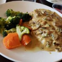 Chicken Marsala · Sautéed chicken breasts topped with sautéed onions, mushrooms and Marsala wine. Served with ...