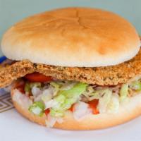 Tenderloin · Pork Fritter that is deep fried and served with Mayo, ketchup, lettuce, tomato and onion