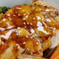 Chicken Teriyaki Don · Grilled chicken and vegetable with a special teriyaki sauce served on a bed of rice.