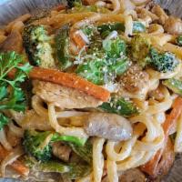Yaki Udon · (Spicy or teriyaki sauce) pan-fried noodles with chicken, shrimp and vegetable and spring ro...