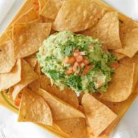 Guacamole  · Served with house-made tortilla chips