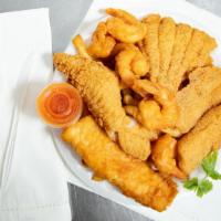 Fish & Shrimp (Combo-28) · Three pieces fish (tilapia, catfish, whiting, perch, bass, swai),ten large shrimp with fries.