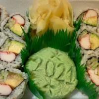 California Roll · Cucumber, avocado, crab stick, sushi rice and sesame seed outside.
