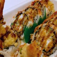 Shrimp Tempura Roll · Tempura, shrimp, avocado, mayo, cucumber & lettuce rolls with seaweed, sushi rice outside wi...