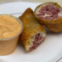 Corn Beef  Egg Rolls · Hand rolled Corn Beef and Swiss Egg Roll