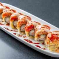Dragon Roll · Shrimp tempura, snow crab mix, spicy tuna, topped with eel, tuna, avocado, scallions, masago...