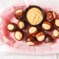 Buckeye Pretzel Bites · A dozen warm pretzel bites served with your choice of beer cheese, peanut butter or honey mu...