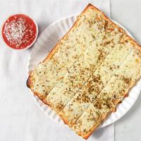 Cheesy Bread · Warm homemade Rustica bread topped with mozzarella cheese, oregano, garlic, drizzled with he...