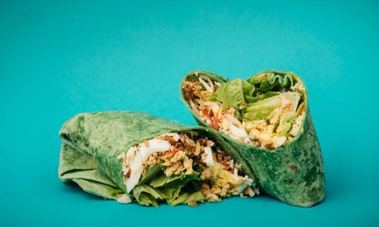 Cali Curry Club · Chicken, bacon, pico de gallo, pepperjack, lettuce, egg, jalapenos and curry ranch, on a spinach tortilla