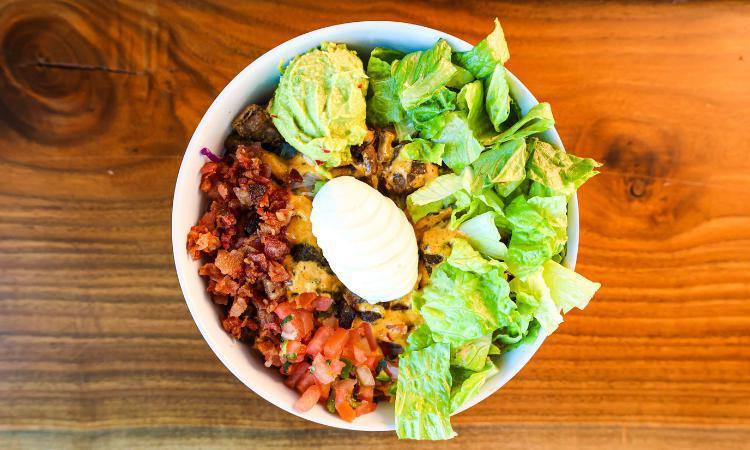 Carne Asada Bowl · Rice noodles, vegetables, hard-boiled egg, lettuce, fried onion, cilantro and chives. Served with steak, bacon, guacamole, pico de gallo and lemon garlic aioli