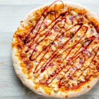 The Bbq Chicken Pizza · Delicious pizza made with grilled chicken, BBQ sauce, onions, and mozzarella cheese.