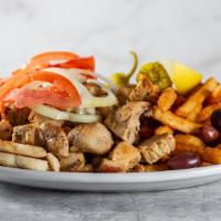 Chicken Shish Kabob Plate · Small pieces of marinated chicken breast served on pita bread with fresh onions and tomatoes...