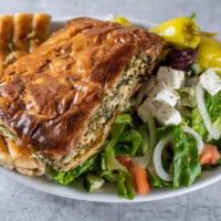 Spinach Pie Plate · Fresh spinach and feta cheese mixed with other herbs and spices wrapped in a filo dough and ...