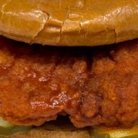Spicy Chicken Sandwich · Buttermilk breaded Chicken sandwich with crinckle cut pickles smothered in our house heat on...