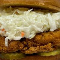 Big Chicken Classic  · Buttermilk breaded Chicken sandwich with crinckle cut pickles Topped with creamy cole slaw o...
